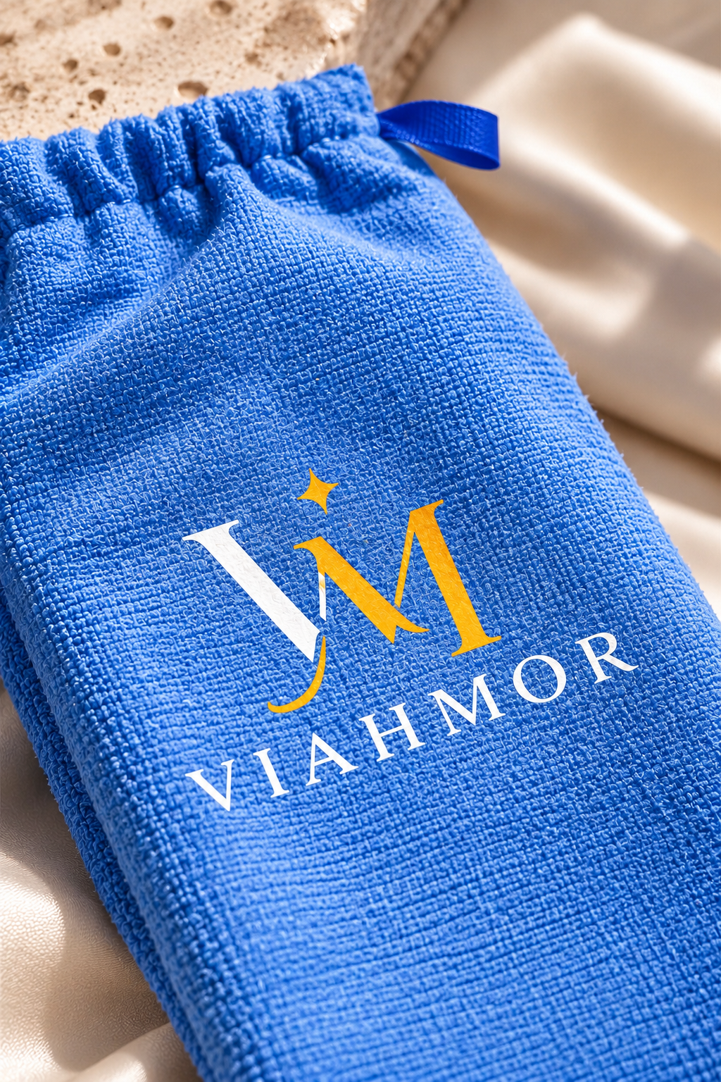 VIAHMOR Blue velvet drawstring pouch with gold logo